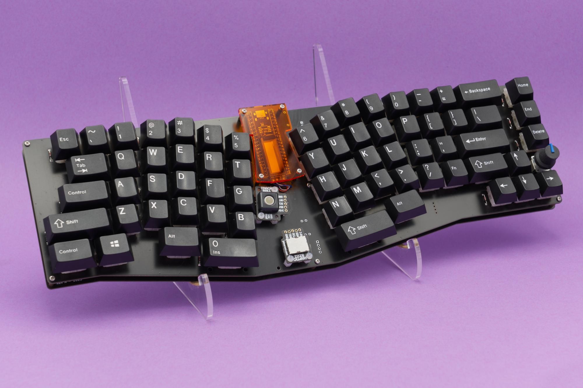 Jasmine mechanical keyboard, angled to show the front and the side.